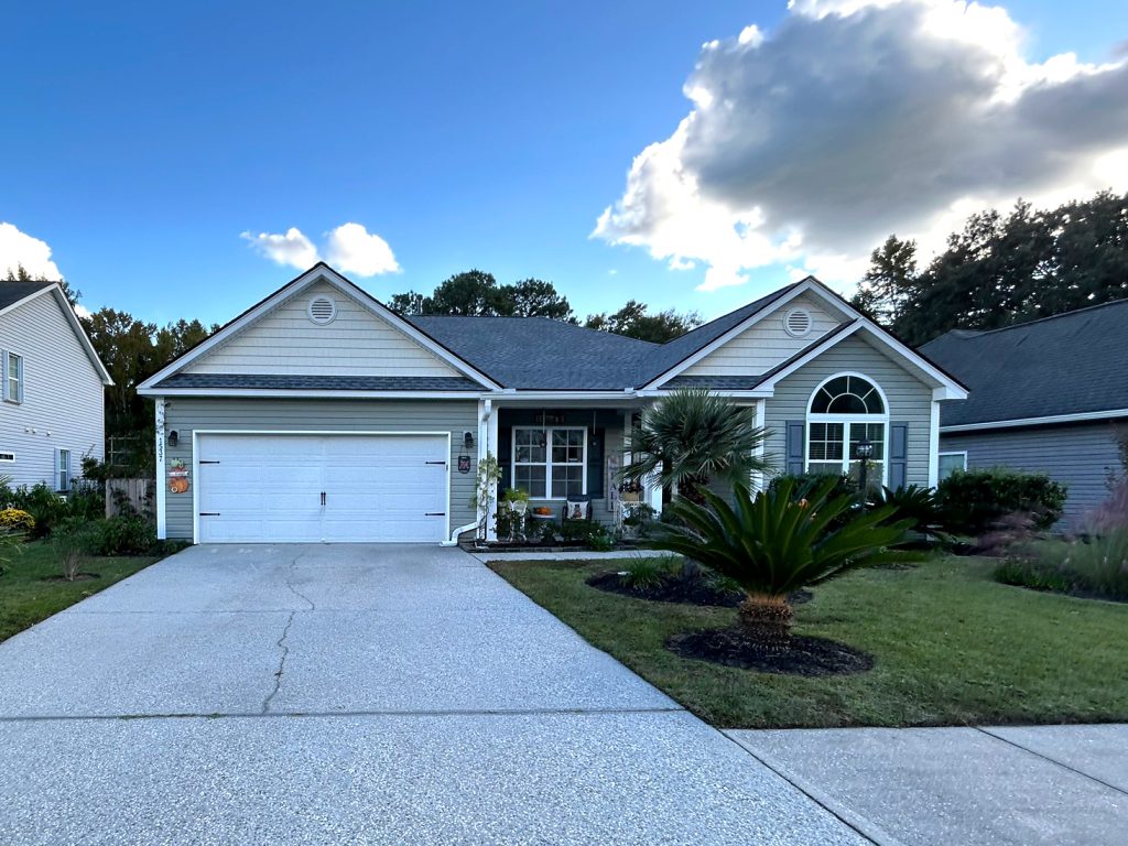 Ground-level view of a completed roofing project in Charleston, SC