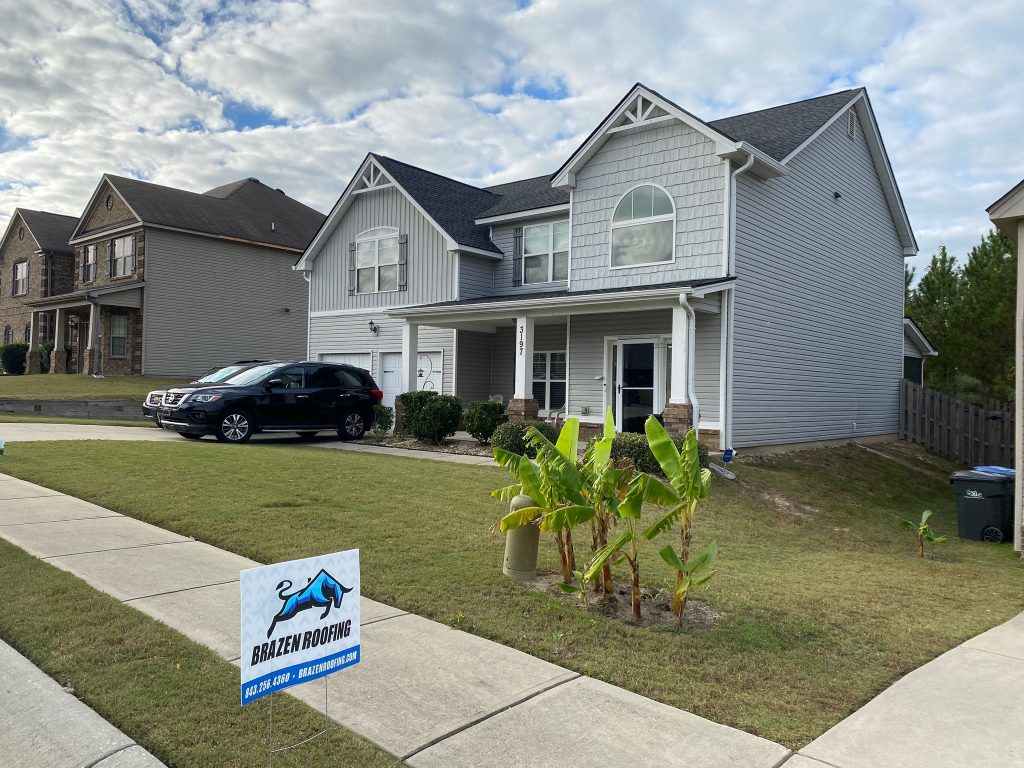 item_44f7bb87-b742-46e3-b607-3d67fa4d9b9e Ground-level view of a completed roofing project in Savannah, GA