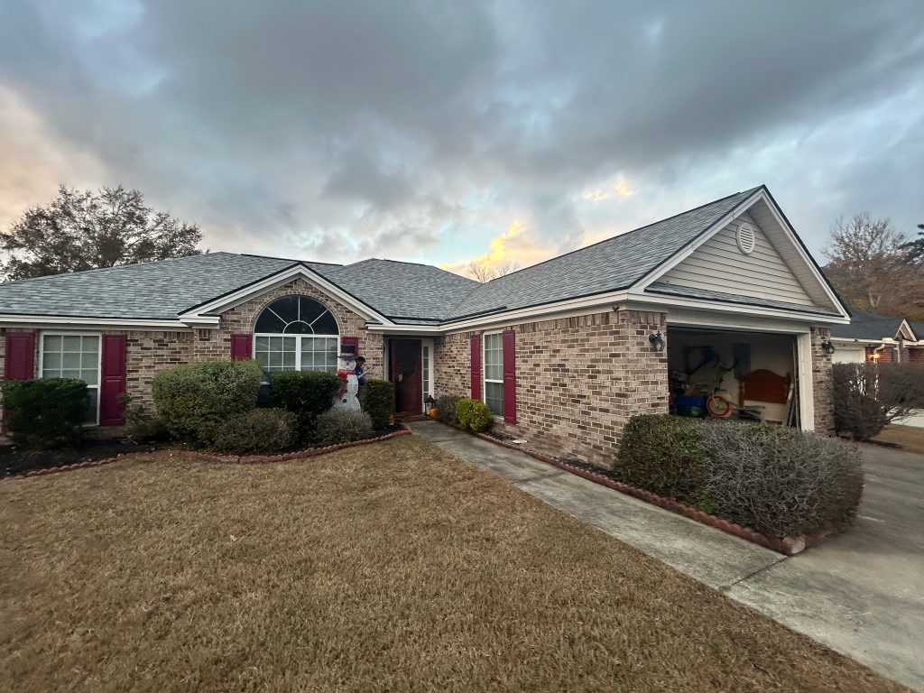 item_71f3a035-7cd0-485f-b62f-3407d3c1bbbb Aerial drone view of a completed shingle roof replacement in Savannah, GA