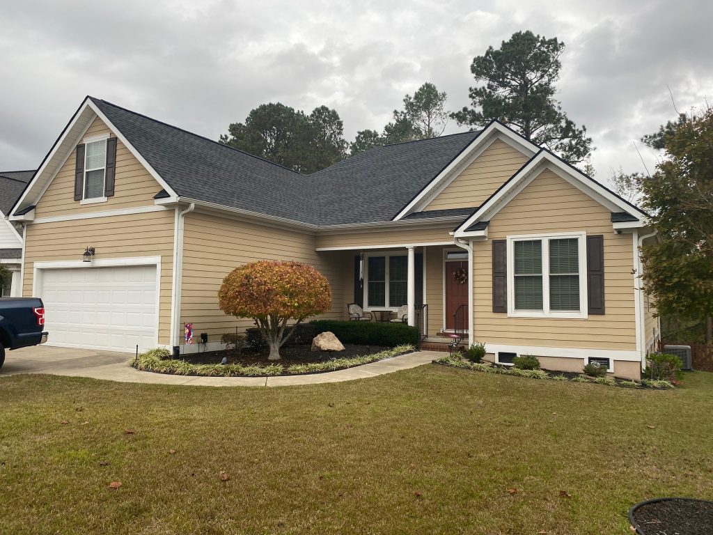 item_85970cc1-72b6-412e-ba54-4fd119cc72bd Brick ranch home with a new shingle roof and mature shade trees in Savannah, GA