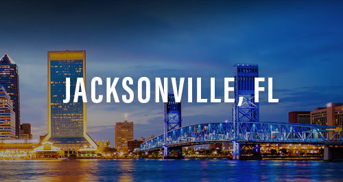 Night view of the Jacksonville, FL skyline and Main Street Bridge over the St. Johns River