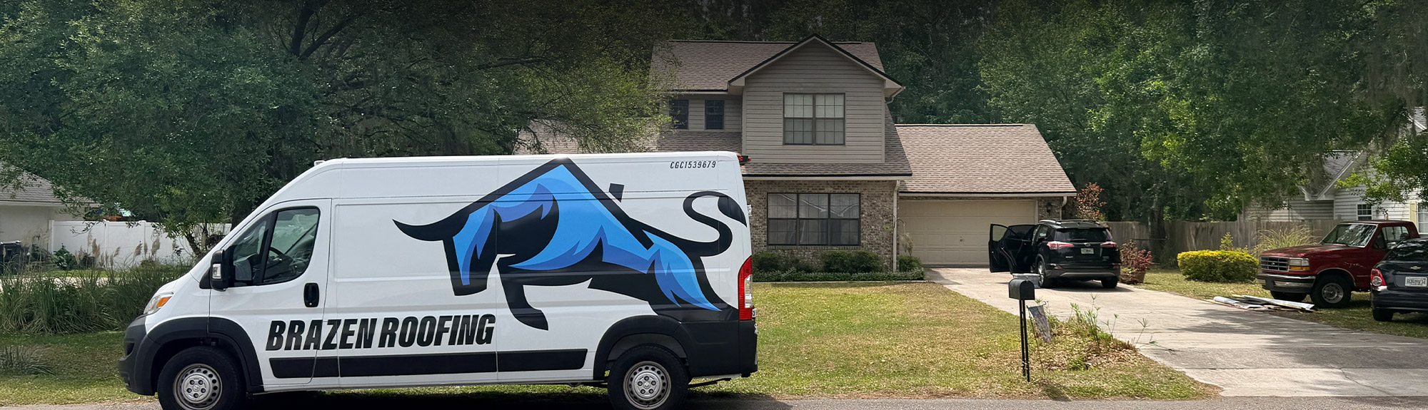 Brazen Roofing van parked outside a home in the Savannah, GA area